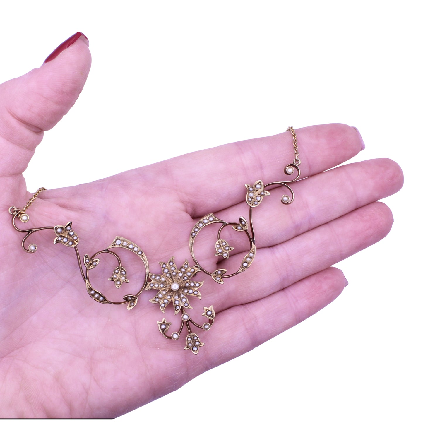 Victorian Yellow Gold and Seed Pearl Flower Necklace Held